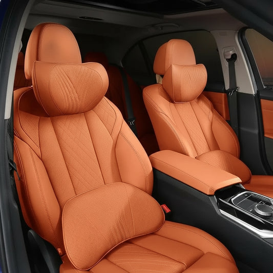 Orange car seats with ergonomic design features and text about long-term driving comfort.